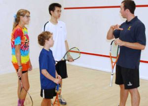 Squash camp coaching session