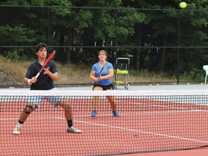 Tennis camp boys and girls doubles